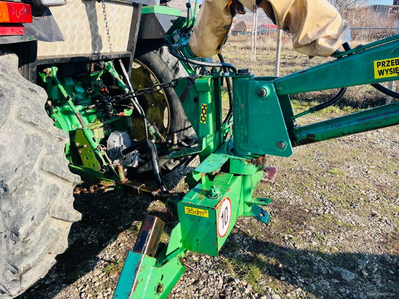 Brat excavator pentru tractor cu cupa si gheare de gunoi Agromet — utilaj agricol de vanzare